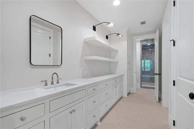 a roof deck with wooden floor barbeque oven and yard in the back