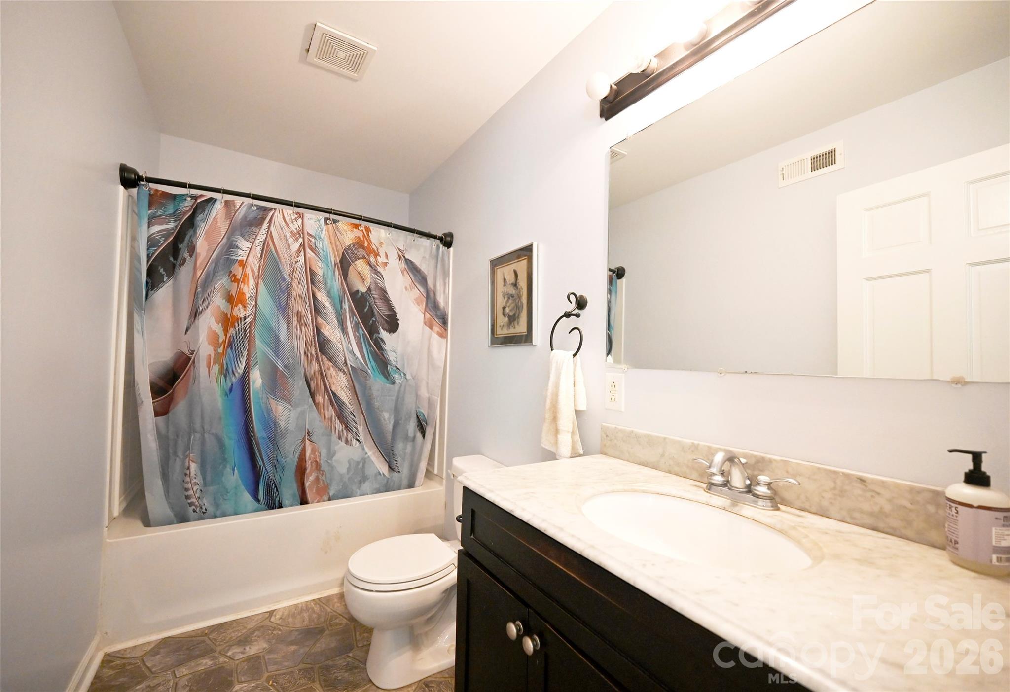 1845 State Rd S-46-149 Clover, SC 29710 - Photo 13 of 28 a bathroom with a granite countertop sink toilet and shower