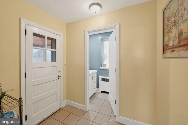 a view of room with window and bathroom