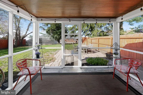 a view of swimming pool with outdoor seating