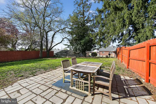 a view of a yard with furniture