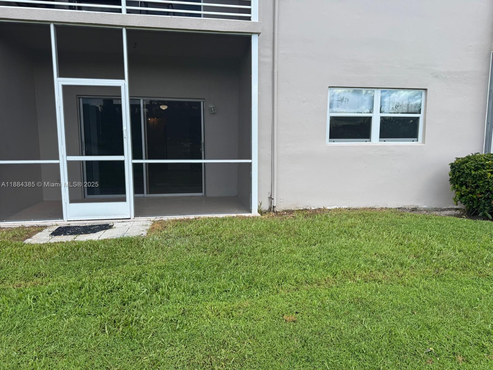 2471 Southwest 82nd Avenue, Unit 108 Davie, FL 33324 - Photo 13 of 14 a view of outdoor space and yard