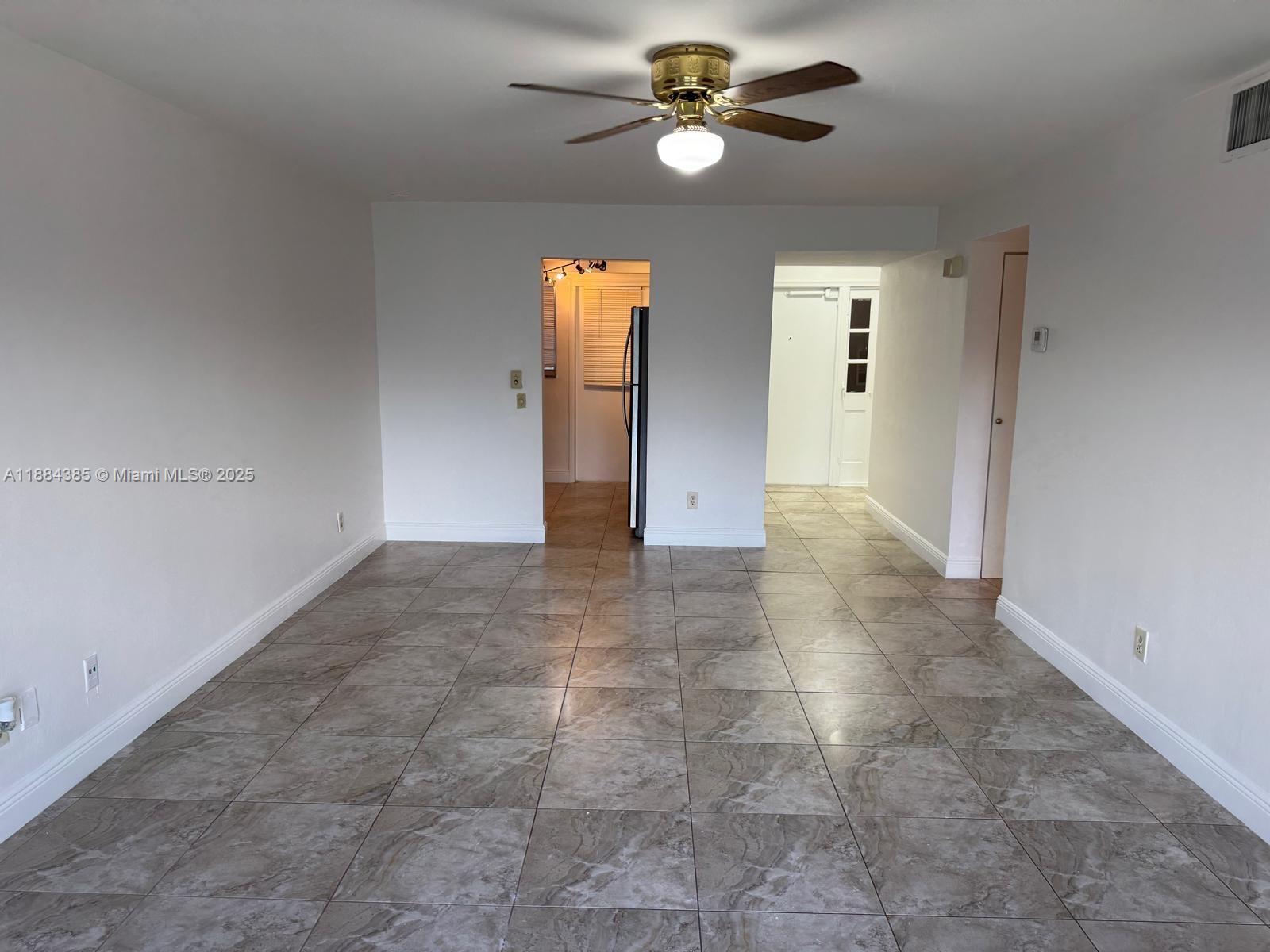2471 Southwest 82nd Avenue, Unit 108 Davie, FL 33324 - Photo 7 of 14 a view of empty room
