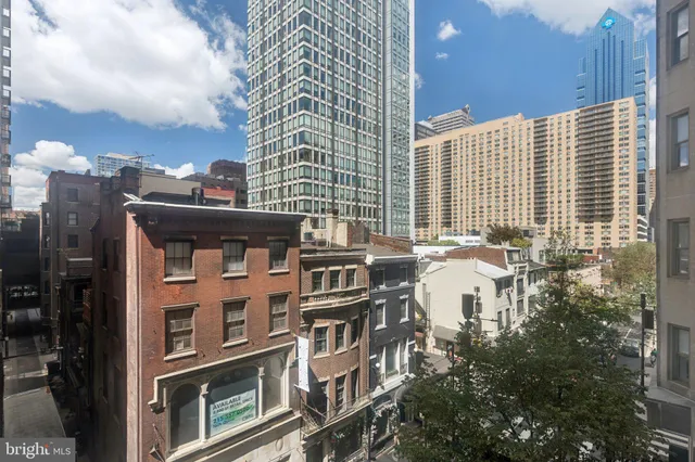 a front view of a building with balcony