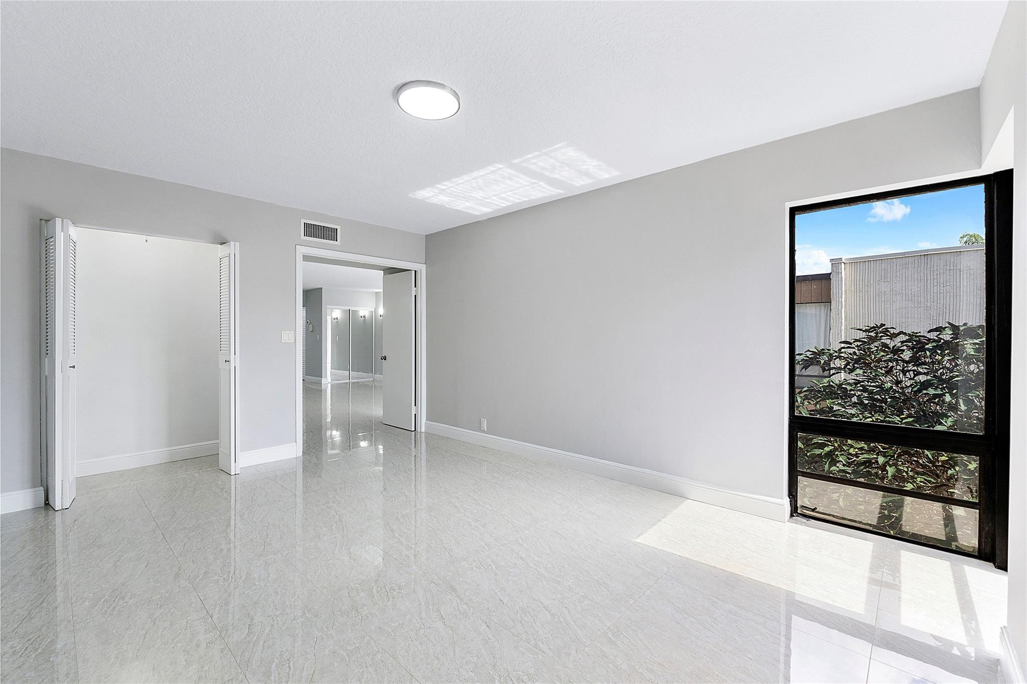 6593 Spring Bottom Way, Unit 237 Boca Raton, FL 33433 - Photo 28 of 49 a view of an empty room and bathroom