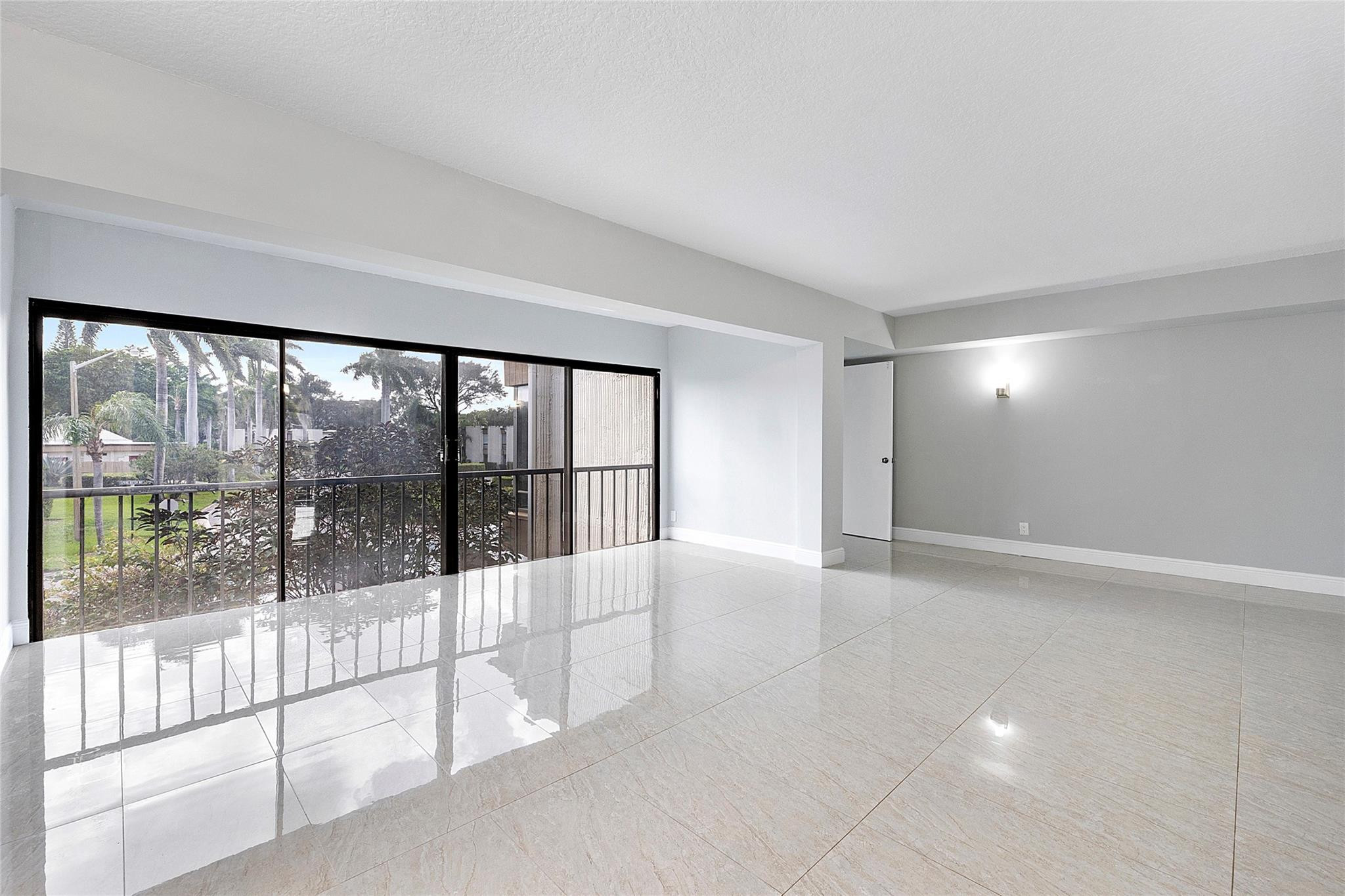 6593 Spring Bottom Way, Unit 237 Boca Raton, FL 33433 - Photo 34 of 49 a view of an empty room with windows