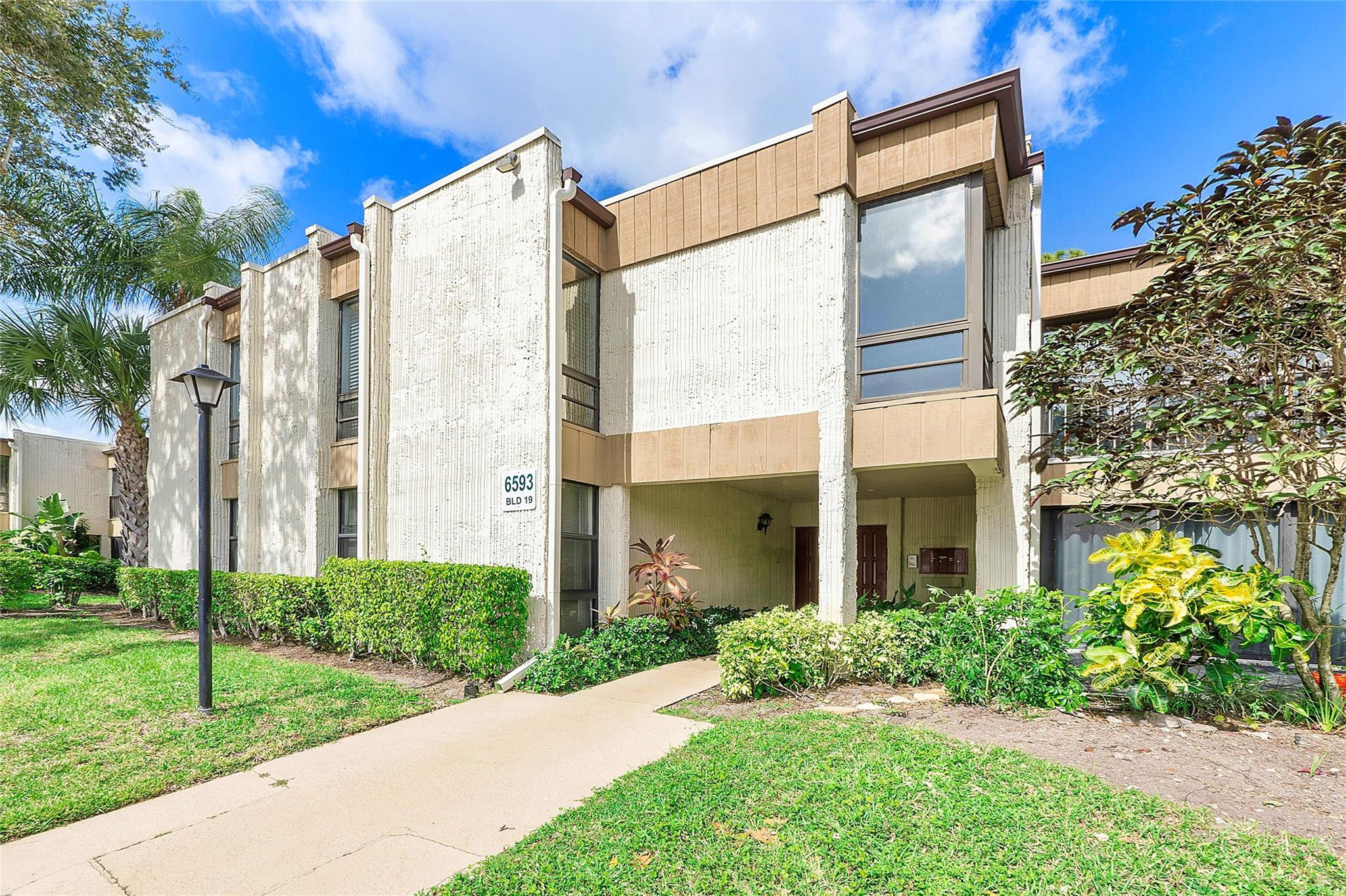 6593 Spring Bottom Way, Unit 237 Boca Raton, FL 33433 - Photo 35 of 49 a view of a back yard of the house