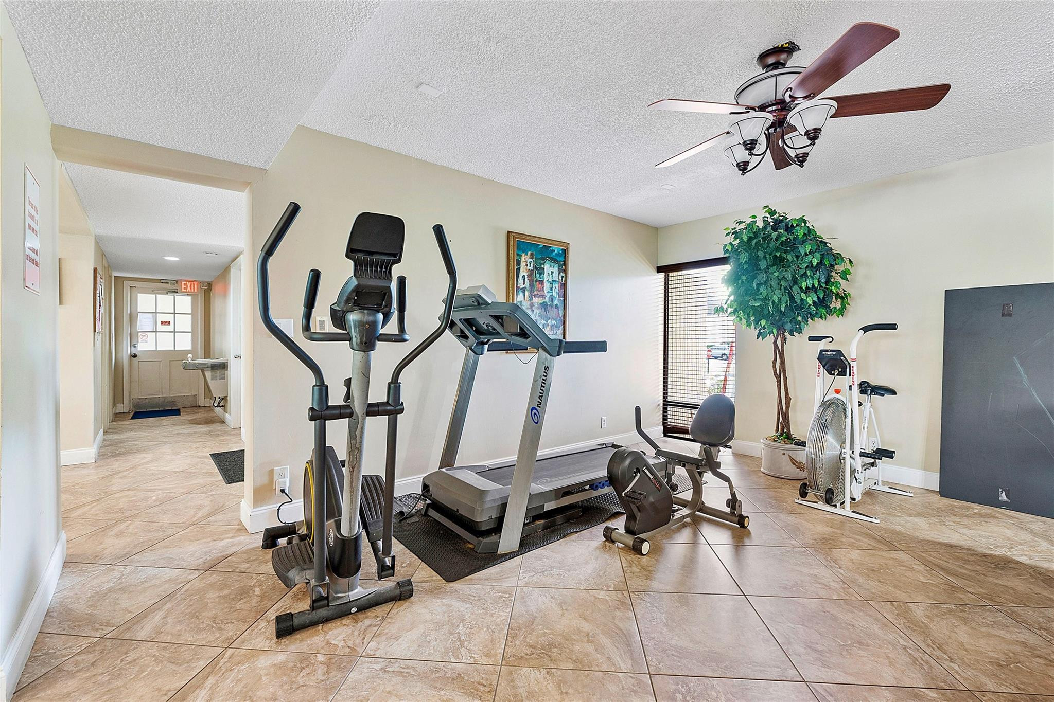 6593 Spring Bottom Way, Unit 237 Boca Raton, FL 33433 - Photo 36 of 49 a view of a room with gym equipment