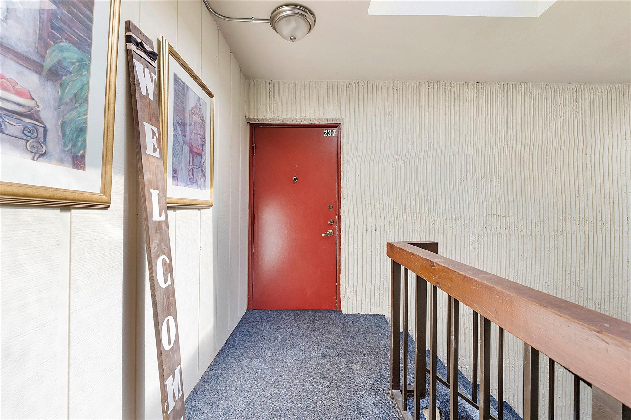 6593 Spring Bottom Way, Unit 237 Boca Raton, FL 33433 - Photo 44 of 49 a view of a hallway with entryway door