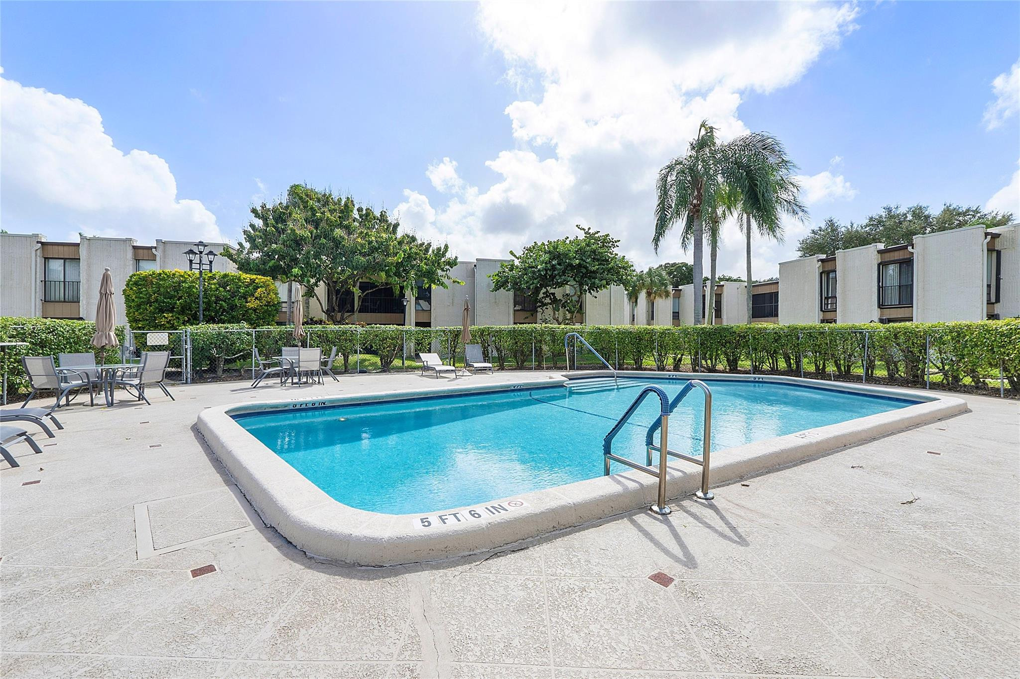 6593 Spring Bottom Way, Unit 237 Boca Raton, FL 33433 - Photo 45 of 49 a view of outdoor space yard swimming pool and patio