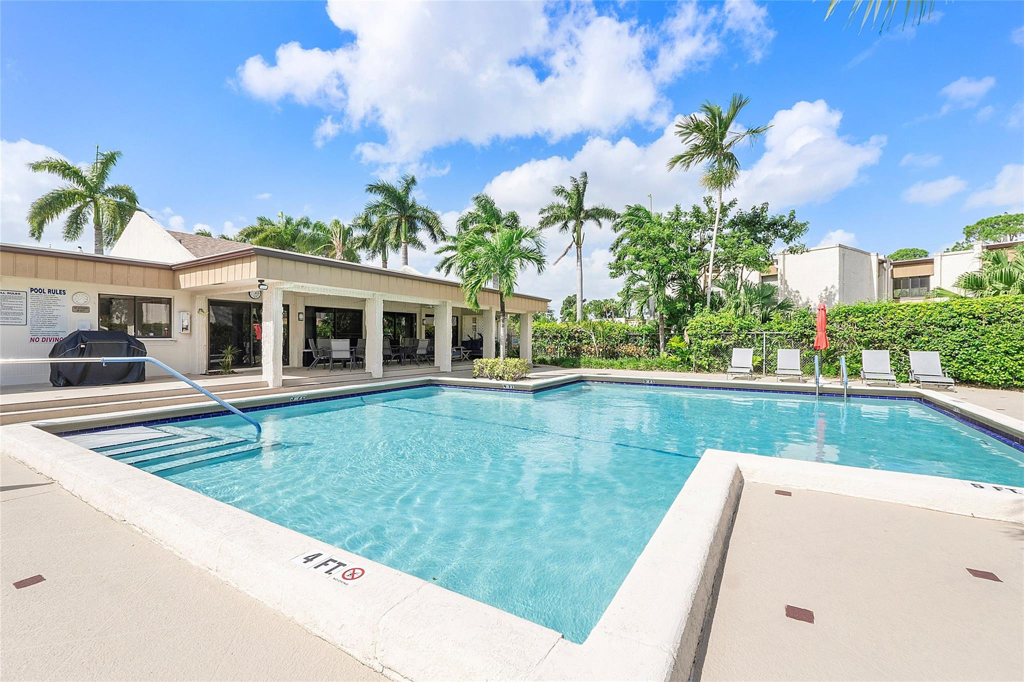 6593 Spring Bottom Way, Unit 237 Boca Raton, FL 33433 - Photo 47 of 49 a view of house with swimming pool