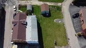 an aerial view of a house having yard