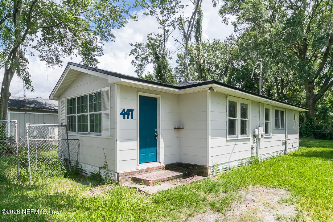 5620 Bagnal Road Jacksonville, FL 32205 - Photo 16 of 31 a front view of house with yard and green space