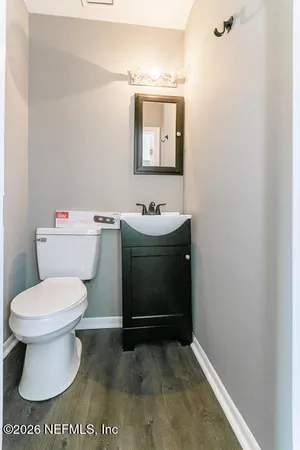 a bathroom with a toilet and a sink