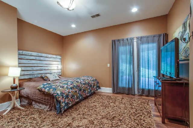 3137 McMillan Road Franklin, TN 37064 - Photo 15 of 20 a bedroom with a bed and a television