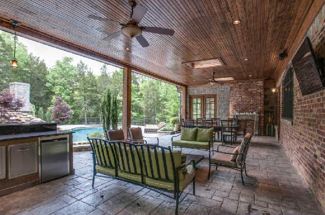 3137 McMillan Road Franklin, TN 37064 - Photo 18 of 20 a living room with patio furniture and a floor to ceiling window