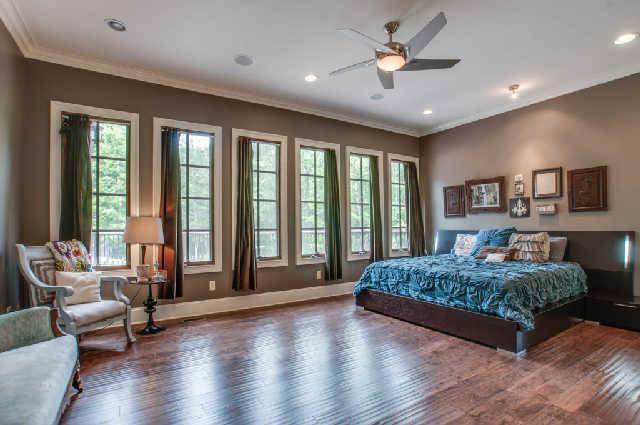 3137 McMillan Road Franklin, TN 37064 - Photo 7 of 20 a living room with a bed furniture chandelier and a large window