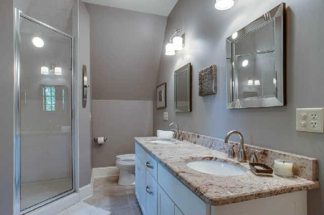 3137 McMillan Road Franklin, TN 37064 - Photo 9 of 20 a bathroom with a granite countertop double vanity and a mirror