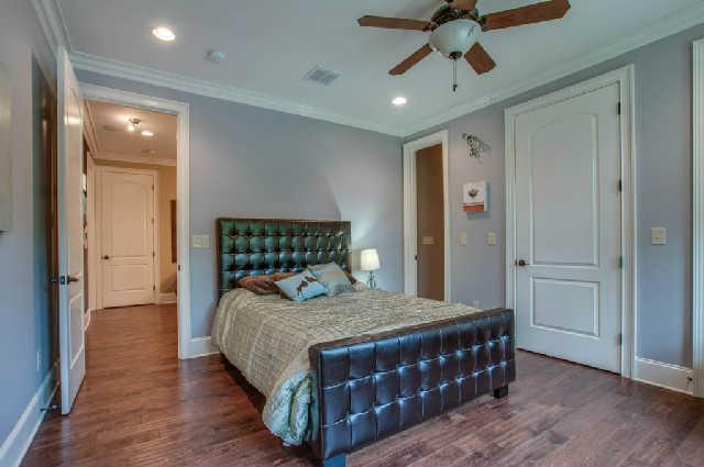 3137 McMillan Road Franklin, TN 37064 - Photo 10 of 20 a bedroom with a bed and wooden floor