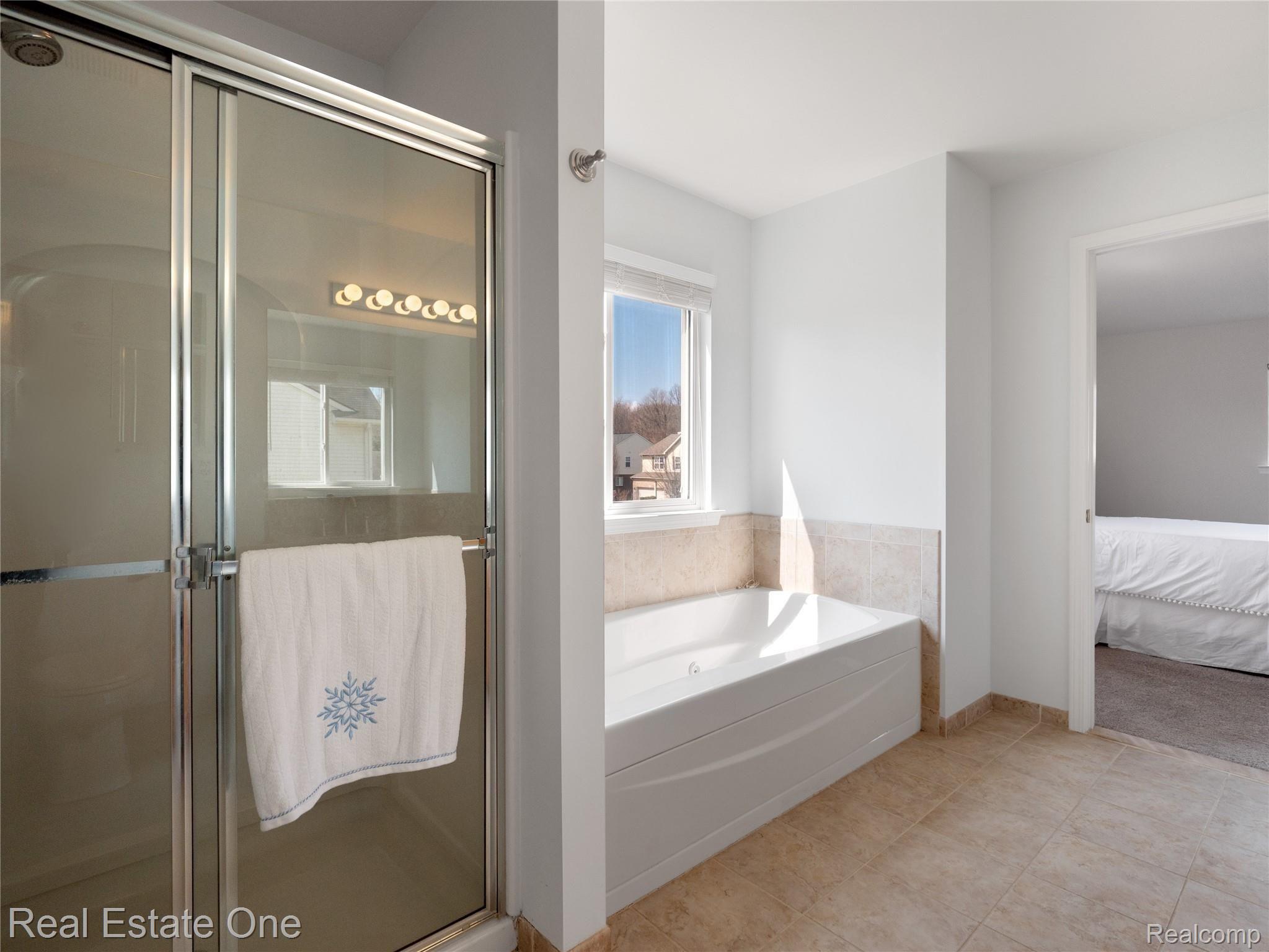 3597 Everett Drive Rochester, MI 48307 - Photo 36 of 57 Master Bath Features a Jetted Tub and a Large Standup Shower.jpg