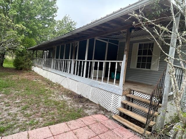 121 White Pine Georgetown, FL 32139 - Photo 1 of 42 a view of a wooden deck