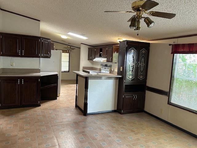 121 White Pine Georgetown, FL 32139 - Photo 28 of 42 a kitchen with stainless steel appliances granite countertop a sink and a stove