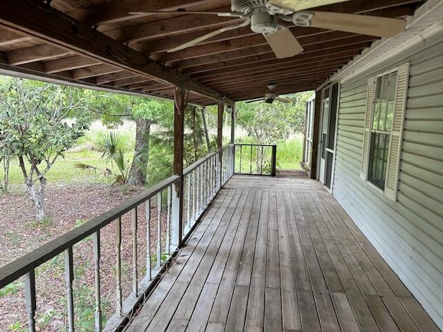 121 White Pine Georgetown, FL 32139 - Photo 3 of 42 a view of porch with wooden floor