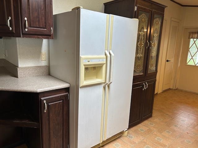 121 White Pine Georgetown, FL 32139 - Photo 32 of 42 a kitchen with stainless steel appliances a refrigerator and cabinets