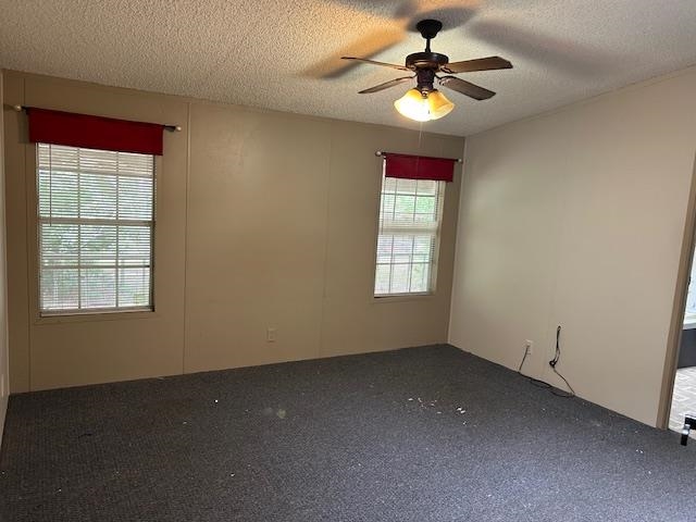 121 White Pine Georgetown, FL 32139 - Photo 37 of 42 an empty room with a window and a chandelier fan