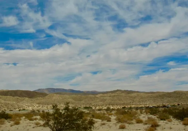 a view of lake and mountain