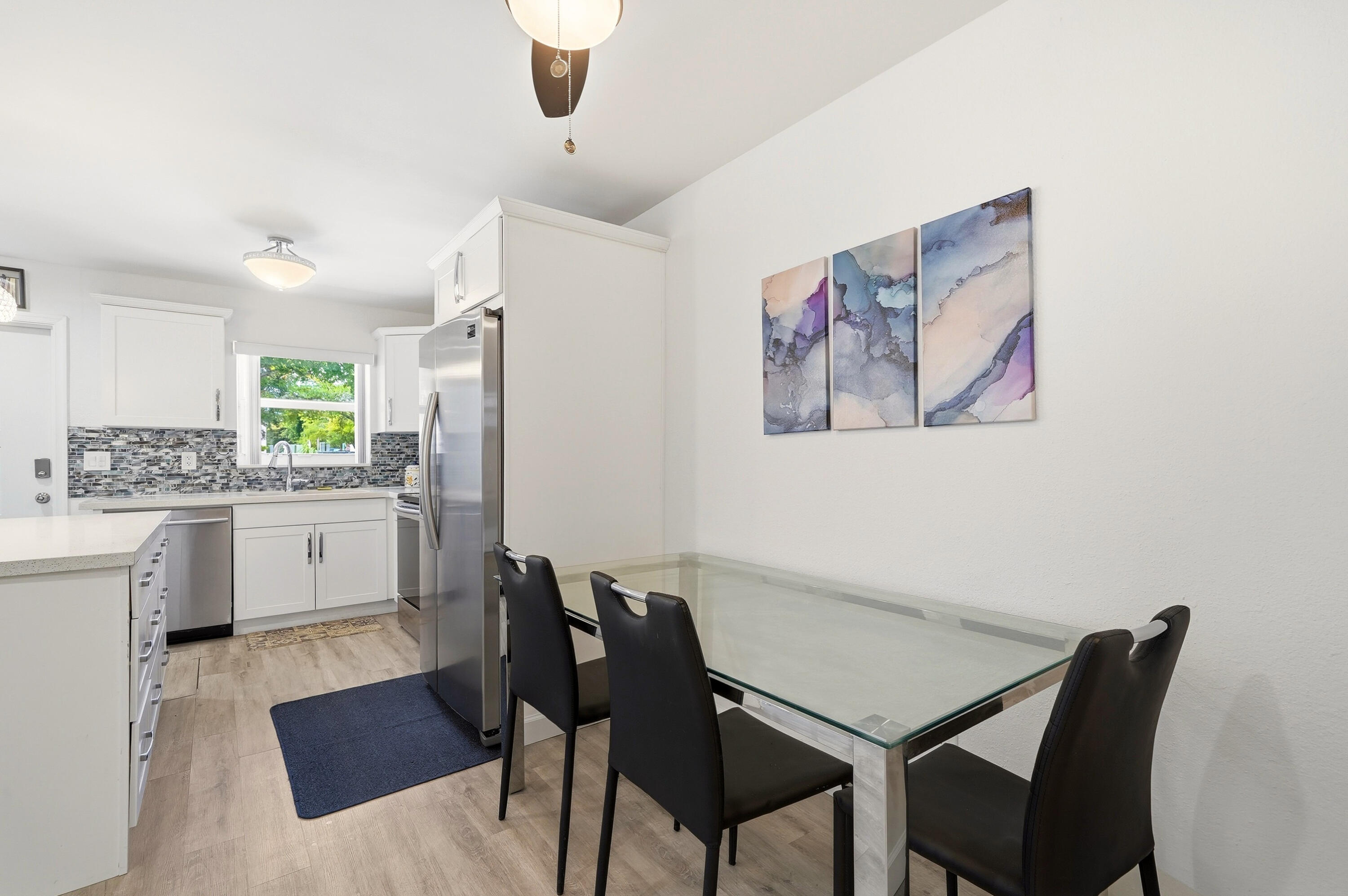 3510 Harrison Street, Unit 4 Hollywood, FL 33021 - Photo 12 of 31 a view of a dining room with furniture and wooden floor