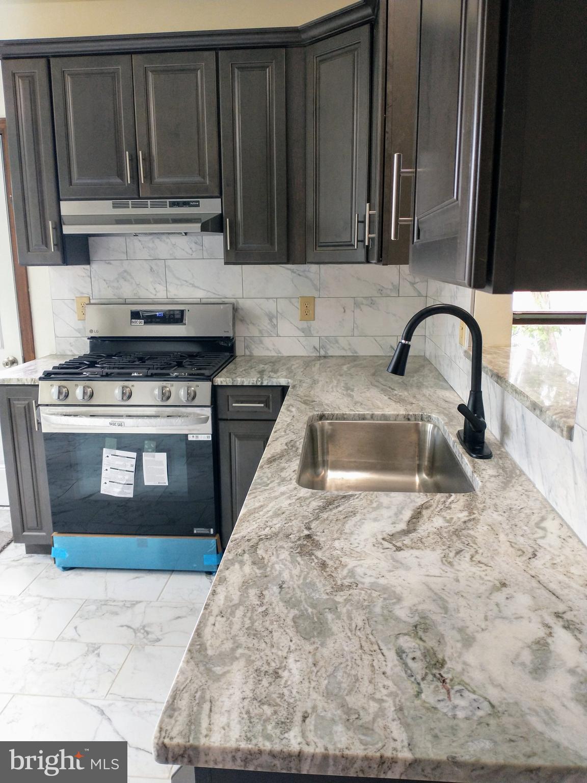 512 Mifflin Boulevard Reading, PA 19607 - Photo 8 of 57 NEW CABINETS AND GRANITE COUNTER