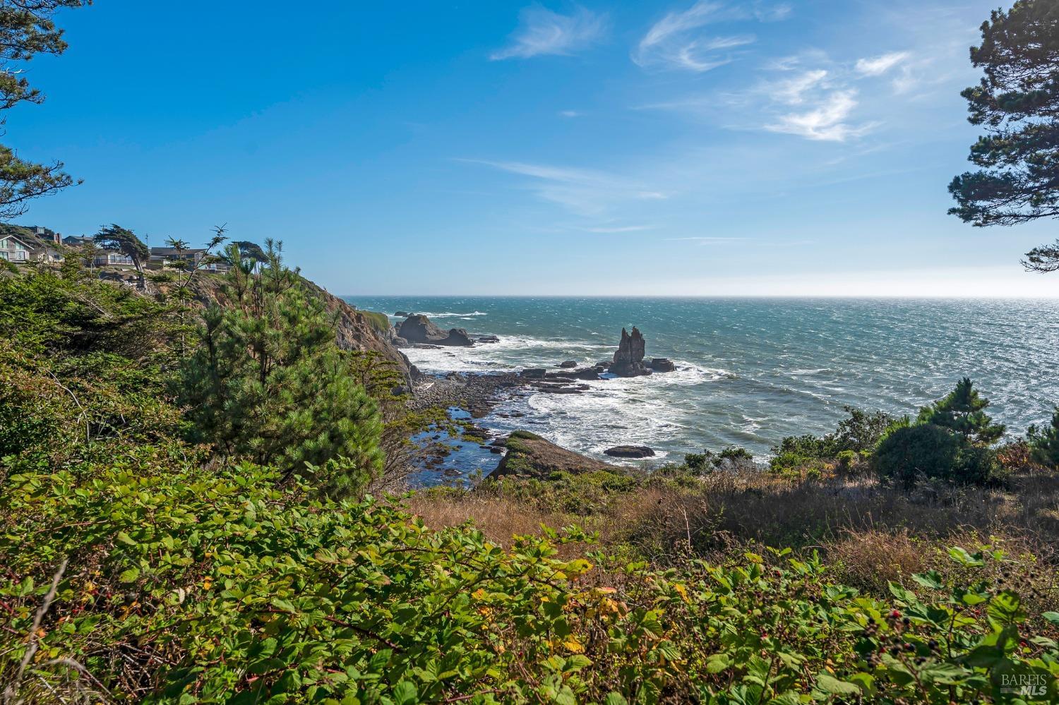 a view of a lake with a building in the background
