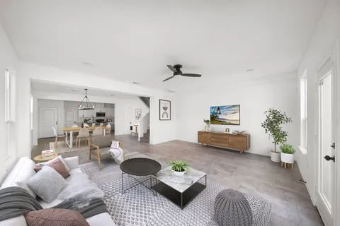 a living room with furniture and a couch