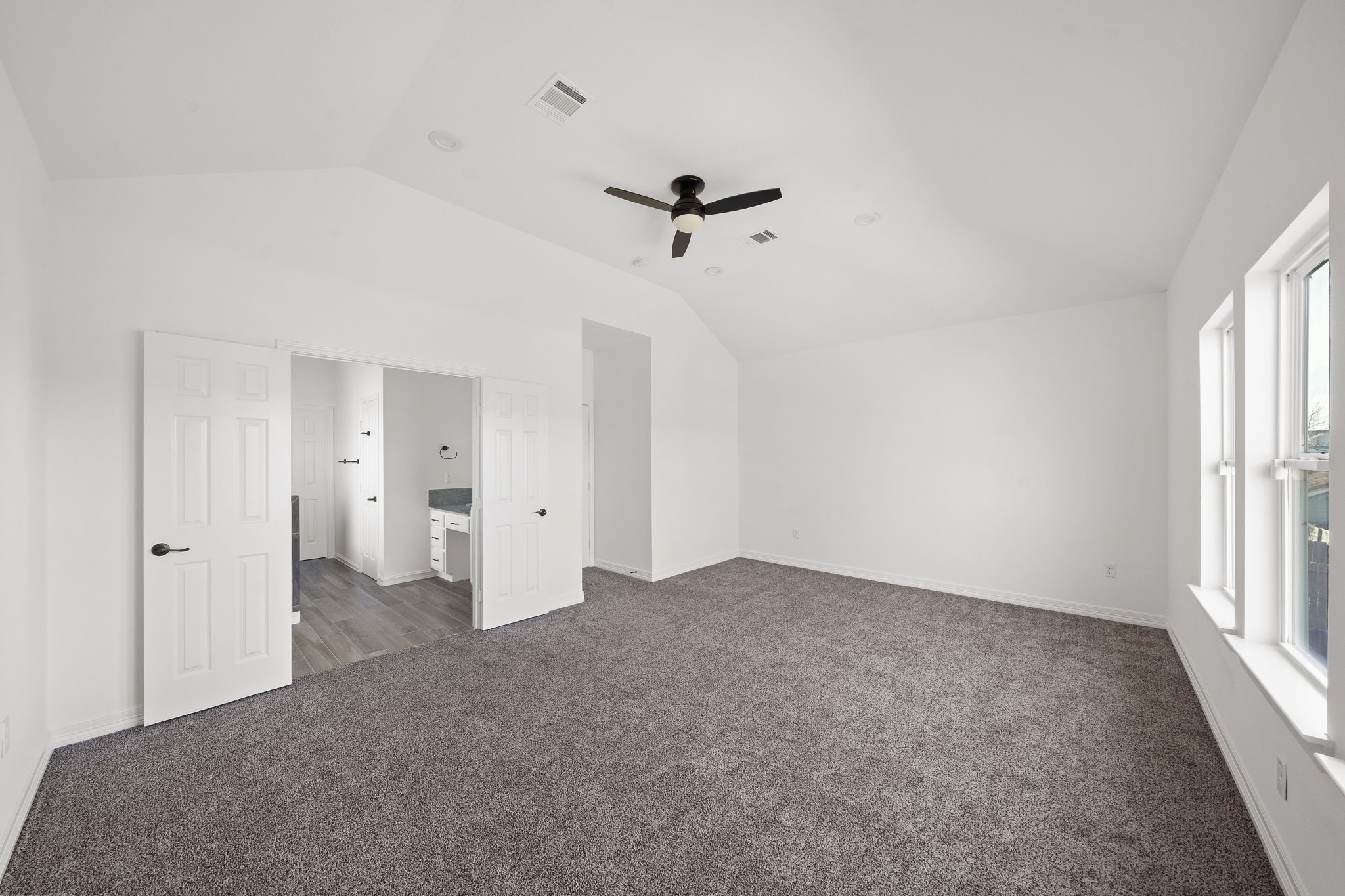 2019 Harlem Street Houston, TX 77020 - Photo 21 of 37 wooden floor in an empty room with a window