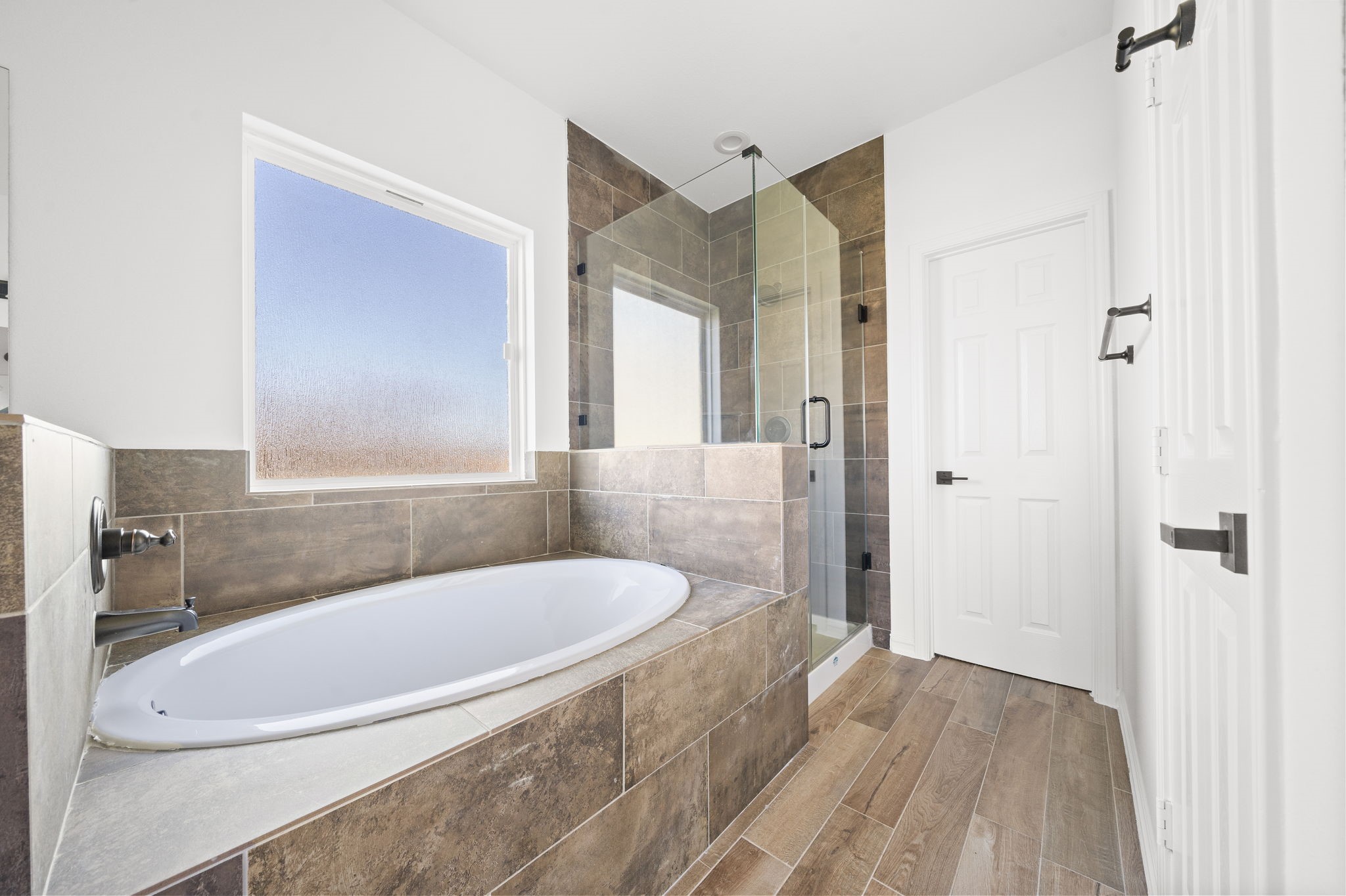 2019 Harlem Street Houston, TX 77020 - Photo 23 of 37 a bathroom with a tub shower and sink
