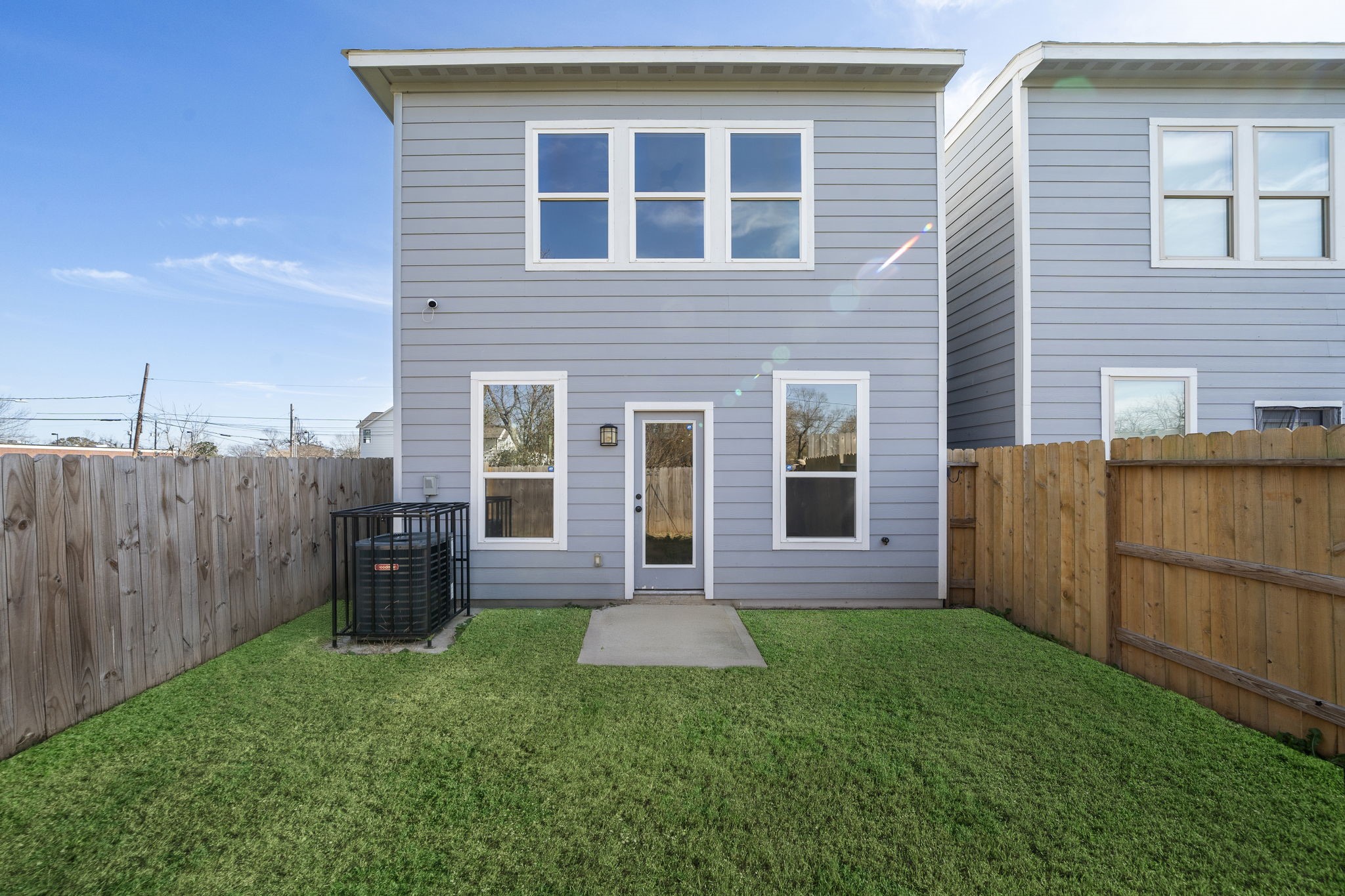 2019 Harlem Street Houston, TX 77020 - Photo 36 of 37 a view of a house with brick walls and a yard with wooden fence