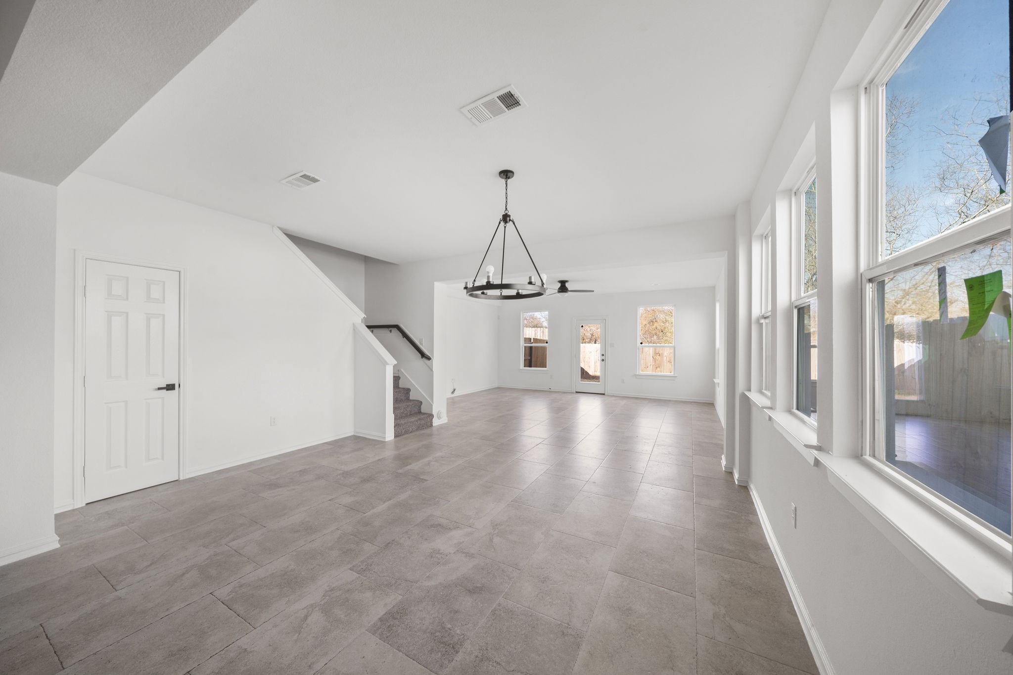 2019 Harlem Street Houston, TX 77020 - Photo 5 of 37 a view of a hallway with wooden floor and windows