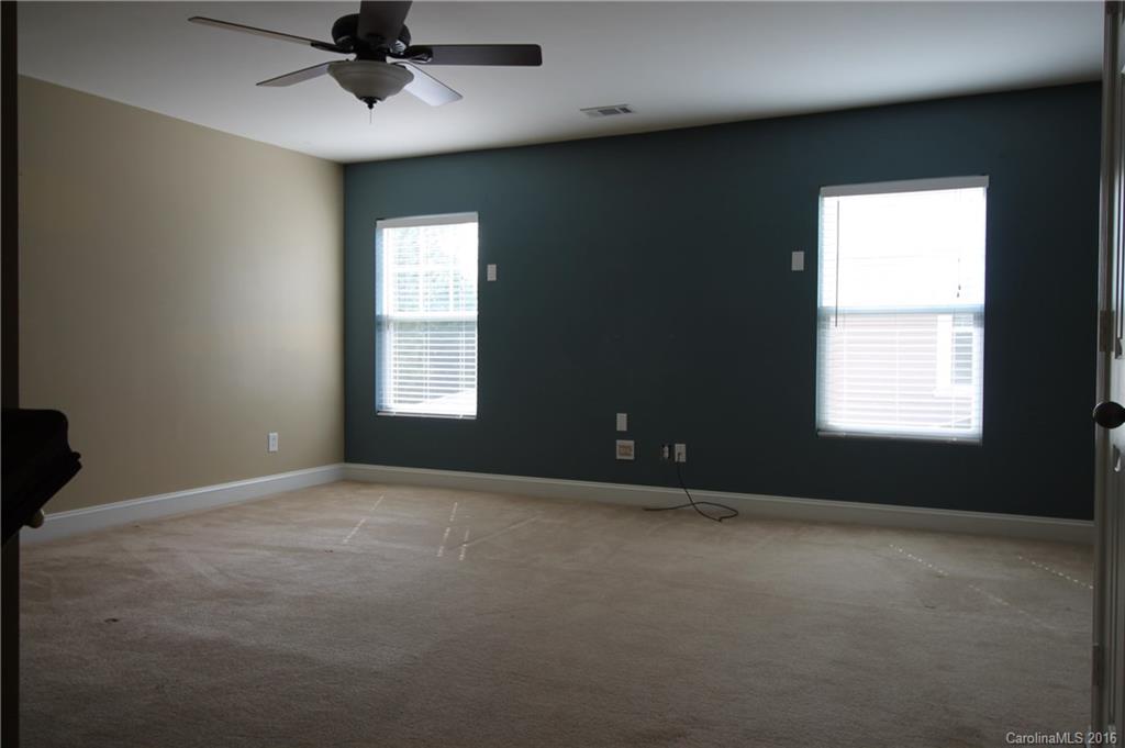 242 River Clay Road, Unit UNTI 202 Fort Mill, SC 29708 - Photo 12 of 18 a view of an empty room with a window