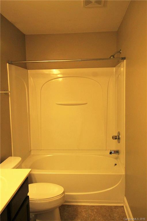 242 River Clay Road, Unit UNTI 202 Fort Mill, SC 29708 - Photo 14 of 18 a bathroom with a shower and a toilet