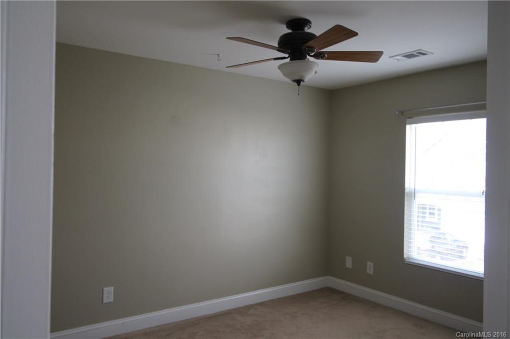 242 River Clay Road, Unit UNTI 202 Fort Mill, SC 29708 - Photo 16 of 18 an empty room with a window