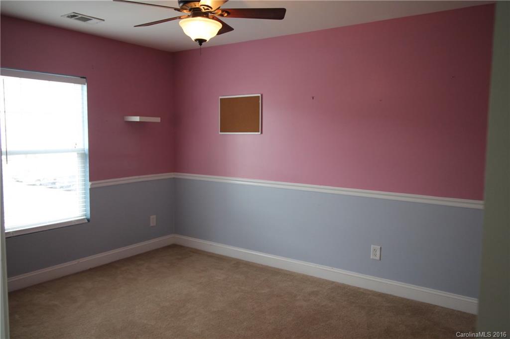 242 River Clay Road, Unit UNTI 202 Fort Mill, SC 29708 - Photo 17 of 18 an empty room with a window