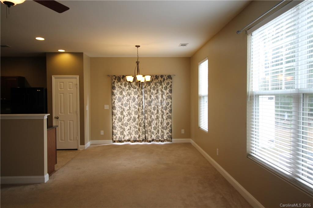 242 River Clay Road, Unit UNTI 202 Fort Mill, SC 29708 - Photo 4 of 18 a view of entryway with window and chandelier
