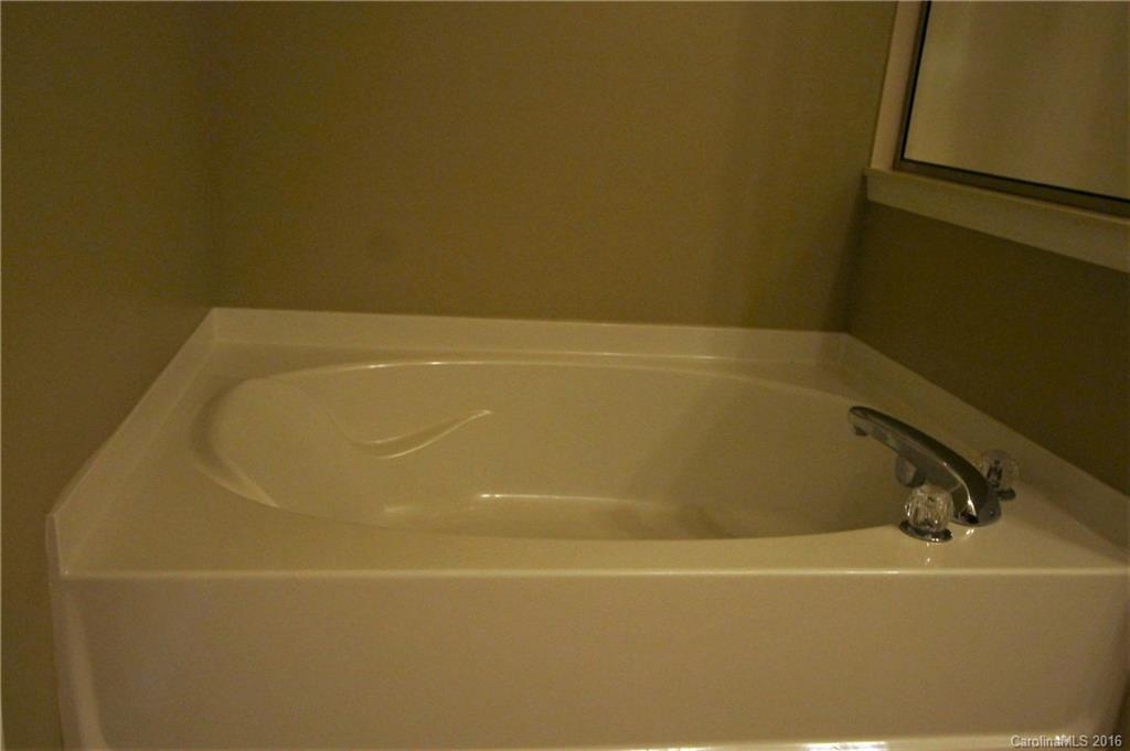 242 River Clay Road, Unit UNTI 202 Fort Mill, SC 29708 - Photo 9 of 18 a bathroom with a bathtub