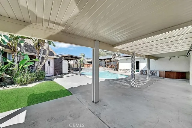 a view of a house with entertaining space