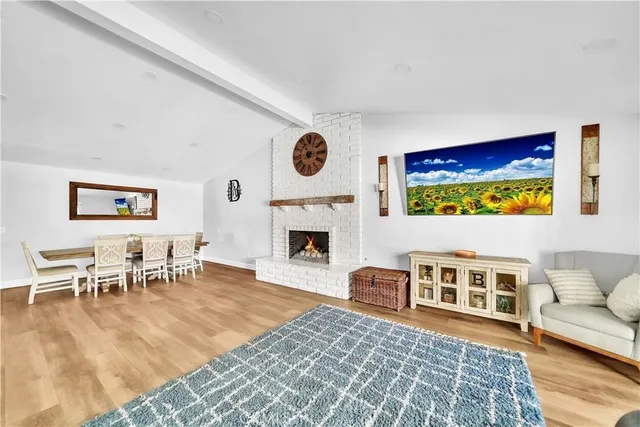 a kitchen with stainless steel appliances a refrigerator sink and stove top oven
