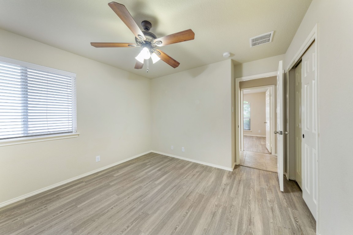 1811 Conn Creek Road Cedar Park, TX 78613 - Photo 17 of 33 wooden floor in an empty room with a window