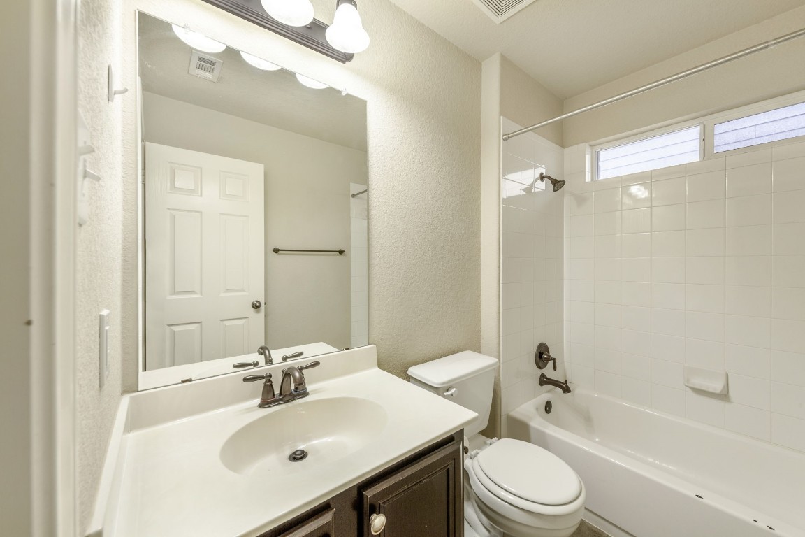 1811 Conn Creek Road Cedar Park, TX 78613 - Photo 20 of 33 a bathroom with a sink toilet tub and shower