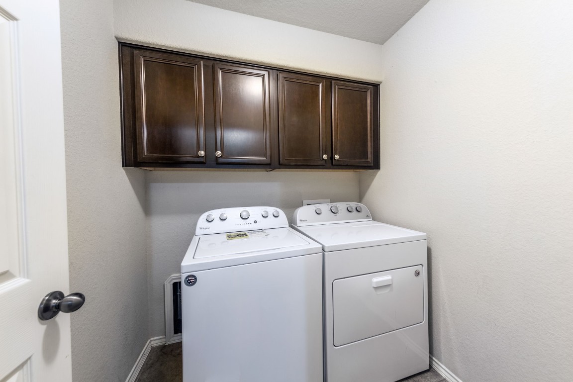 1811 Conn Creek Road Cedar Park, TX 78613 - Photo 30 of 33 a utility room with dryer and washer