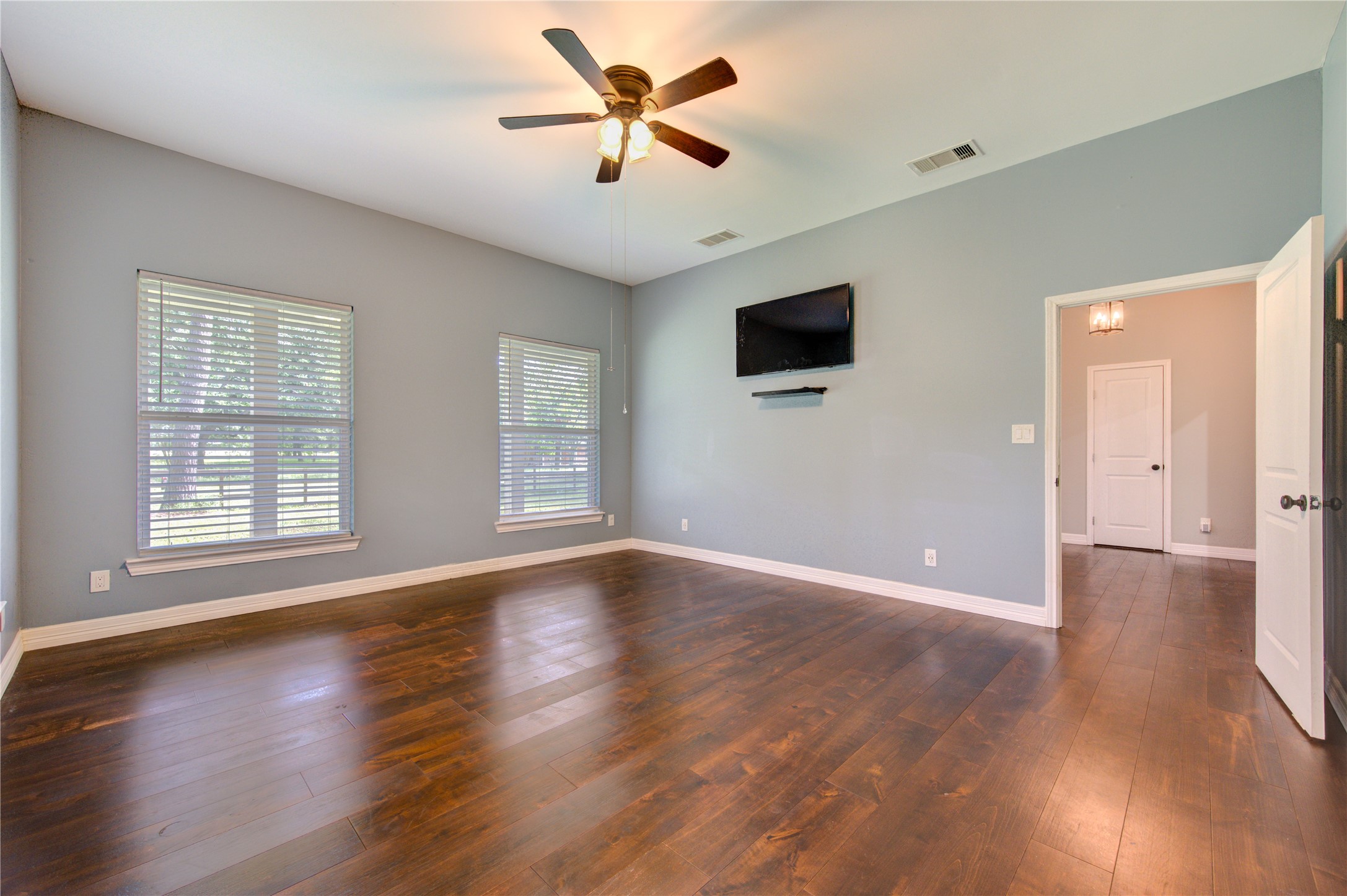 20531 Faye Tomball, TX 77377 - Photo 25 of 43 a view of an empty room with wooden floor and a window